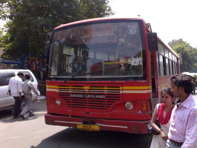 Ashok Leyland viking SLF PMPML bus at zooming along a narrow road opp. Pune Station