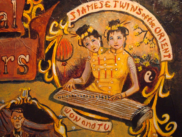 Dr. Z's Traveling Carnival (detail) showing Won and Tu, Siamese twins of the Orient