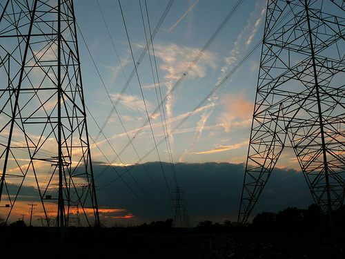 sunset lines clouds power towers trails pylons vapor