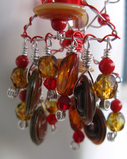 Not Your Everyday Chandeleirs..Swarovski crystals. Baltic Amber. Czech Fire polished Beads. Handblown Artisan glass disks. Red coral