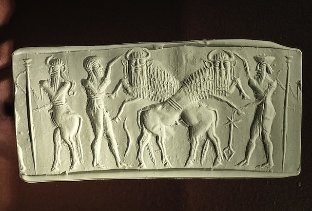 Impression made from an Akkadian Cylinder Seal recovered in Ur in modern day Iraq 2300-2100 BCE