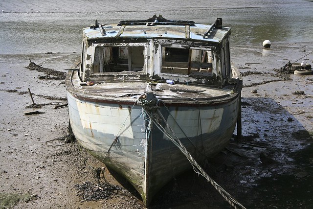 Truro Riverbank life. Malpas side. decommissioned fishing boat.