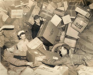 U.S. Troops Surrounded by Holiday Mail During WWII | by Smithsonian Institution