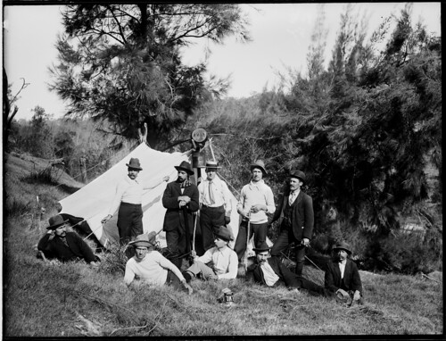 Ten men near a white tent | by Powerhouse Museum Collection
