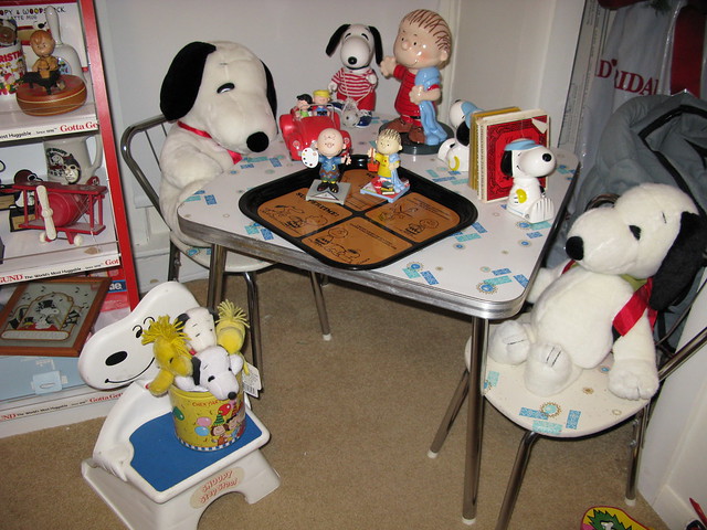 Snoopy Stuffed Animals sitting at child's formica table
