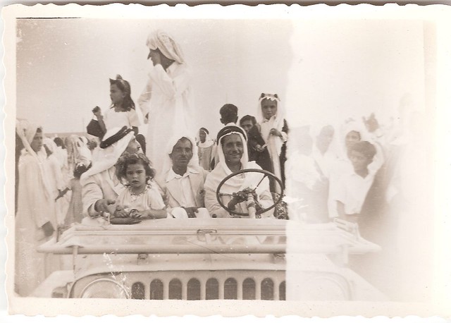 Arab Family in a Jeep in Kuwait; about 1950.   الأسرة العربية في سيارة جيب في الكويت ؛ عن عام 1950.