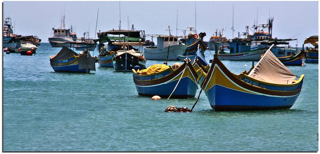 malta isle marsaxlokk * fishing village * boats by Paolo Brunetti