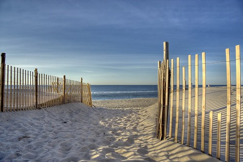 ocean wood morning blue shadow sea sky beach sunrise fence newjersey sand waves dunes lbi longbeachisland shore jersey jerseyshore
