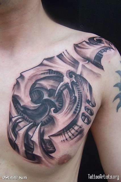 Biomechanical Chest Tattoo by Tattoo by Roman