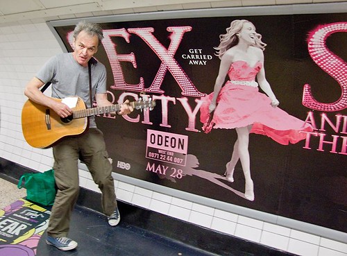 Sex and the City, Saturday busker, Charing Cross Underground, London by chrisjohnbeckett