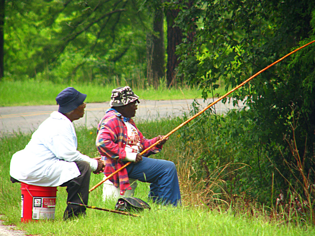 Cane Pole Fishin', Two women cane pole fishing in Doyle Arm…