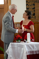 The ending of my mother's vow to Paul -- whom she met in a ballroom dance class -- as they lit candles honoring the spouses they'd each lost to cancer in years past.
