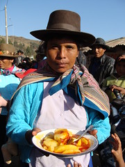 Woman serving us lunch at celebration in Huyuculano Woman serving us lunch at celebration in Huyuculano
