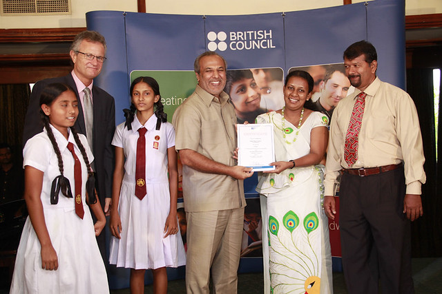 Deepani Maha Vidyalaya, Anuradhapura receiving the certificate for being among the schools who have submitted the best 10 portfolios of evidence for the International School Award 2011