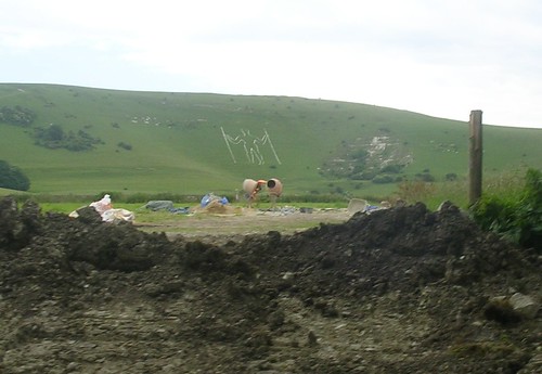 Long Man With ritualistic cement mixers Berwick to Eastbourne