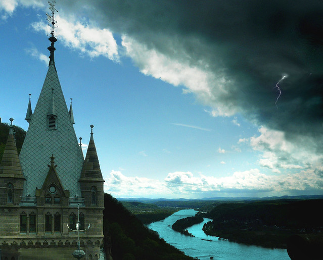 Dark clouds approach Castle Drachenburg
