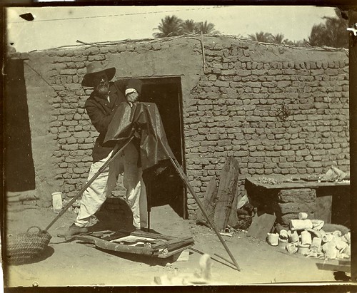 Flinders Petrie photographing finds at Abydos 1902-03, from Margaret Murray’s photograph album