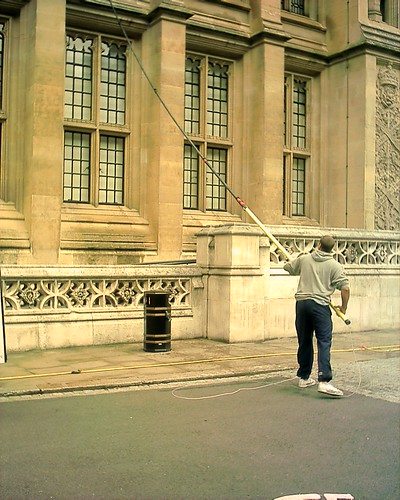 Cleaning the windows of the Maughan Library