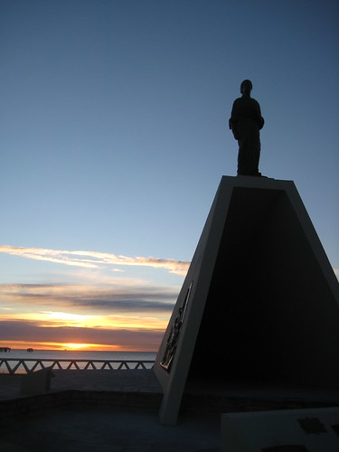 shadow beach monument argentina statue america sunrise puerto south opaque madryn
