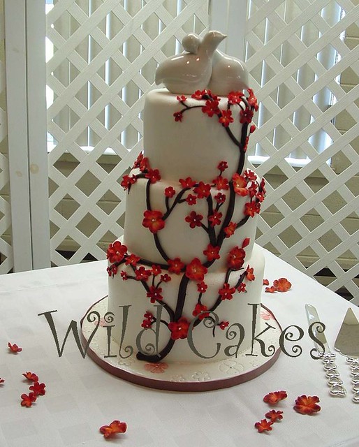 red cherry blossom wedding cake