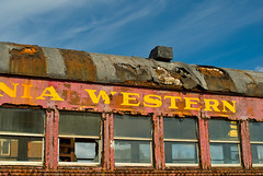 Rust and peeling paint on abandoned train coach