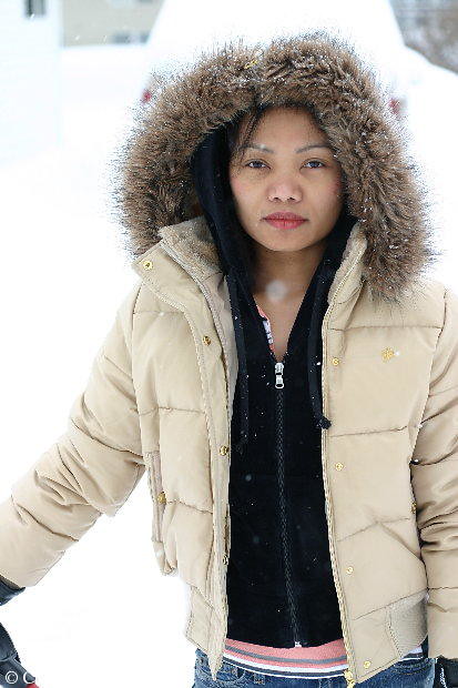 Young Woman in Winter Coat After a Snowstorm