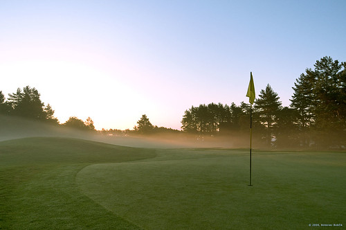 green sunrise golf haze flag course