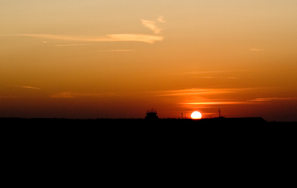Sunset over the airport on Alderney by neilalderney123