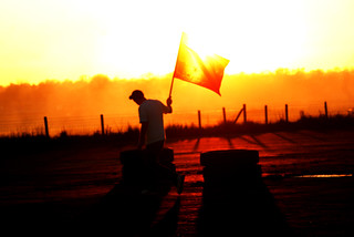 Flag Guy at sunset