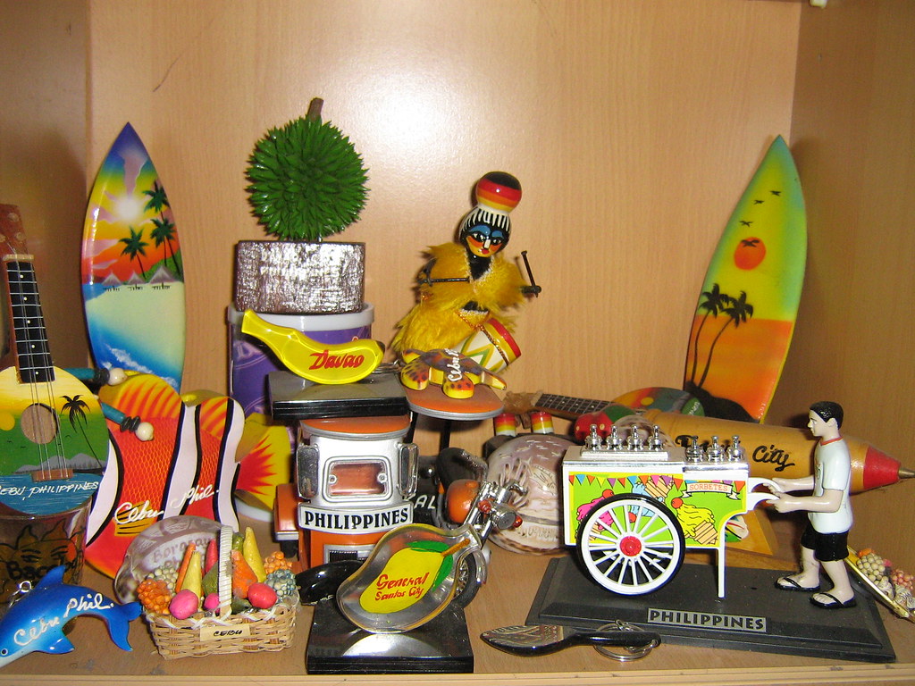 Miniature durian from Davao, guitar, fish and dolphin from Cebu, tricycle,