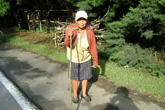 Woman carrying her bundle of firewood