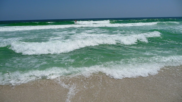 Surfing the Gulf of Mexico at Navarre Beach