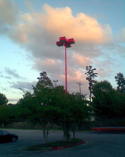 lit by Stephen J Alexander, this lamppost at a target store in Tyler, tx was lit up nicely and framed by the cloud - drew my eye