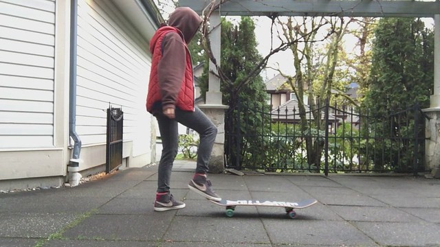 stepping onto skateboard