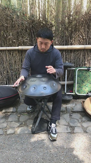 Brief video of a street musician playing the Hang or Handpan drum