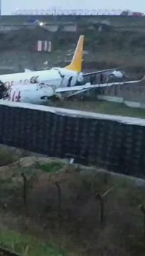 Turkey- A Pegasus airlines plane overruns runway, breaks into two at Istanbul airport - YouTube