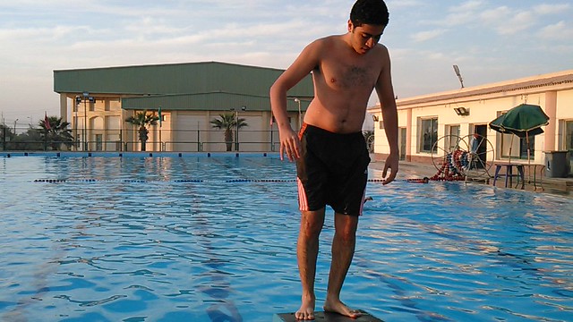 Swimmer Doing Outstanding Flip In Pool