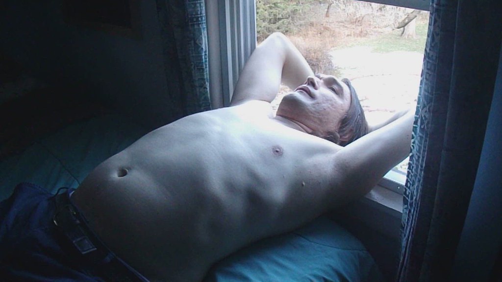 Shirtless in the Window