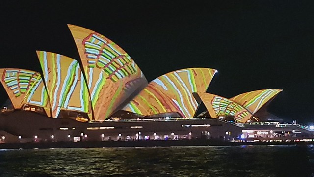 Artistic light show on the sails of the Opera House at VIVID - Festival of Lights May/June 2022, Sydney, New South Wales, Australia