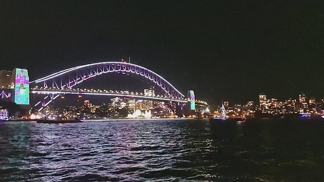 Artistic light show on the Harbour Bridge and surrounds at VIVID - Festival of Lights May/June 2022, Sydney, New South Wales, Australia. This event takes place over the course of three weeks in May and June.
