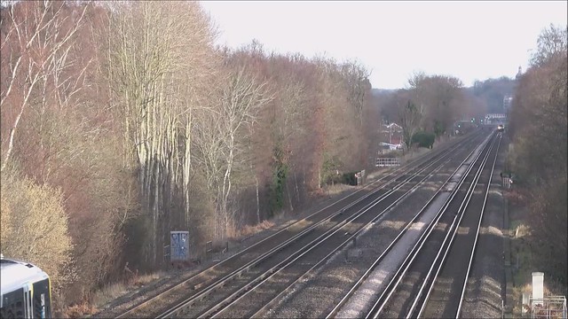 RD24704Vid)  Trains at Southwood between Farnborough Main and Fleet.