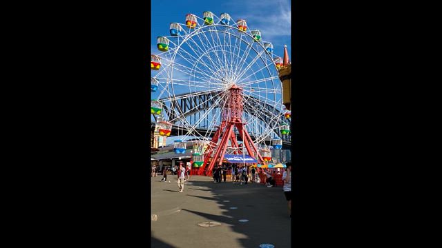 Ferris Wheel and Sydney Harbor Bridge