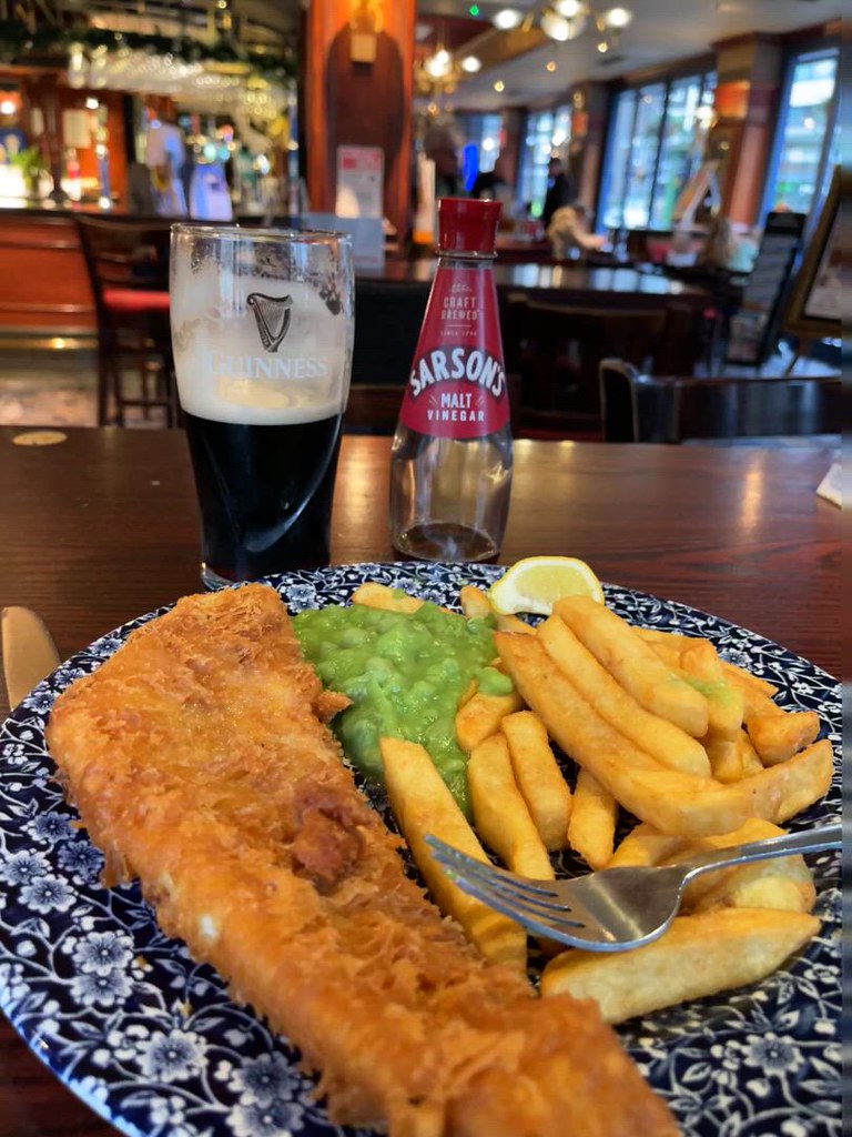 IMG_6680 The Masque Haunt Old Street Shoreditch London JD Wetherspoon Pub Cod Fish and Chips with Mushy Green Peas Sarsons Malt Vinegar and a pint of Guinness Stout Beer £9.85
