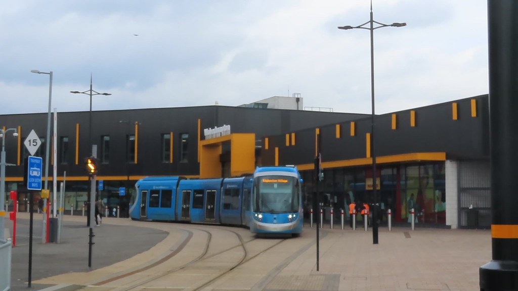 West Midlands Metro tram 56 arrives at Wolverhampton Station Tram Stop - HD video clip