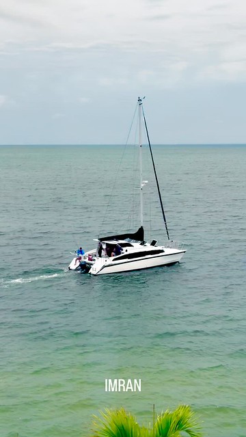 Sailor Sailing Larger Lovely Cute Catamaran Calm Cloudy Seaside Serenity Solitude Scene - IMRAN™