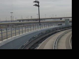 Riding on Skylink at DFW (clip #4) - November 14, 2005.  Taken from a very 