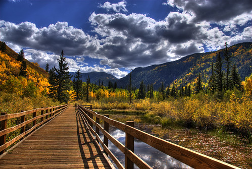 wood bridge blue autumn trees sky mountains fall nature water colors clouds landscape colorado footbridge foliage explore boardwalk aspen preserve hdr bridging northstar photomatix bridgepixing bridgepix 200809 goldstaraward