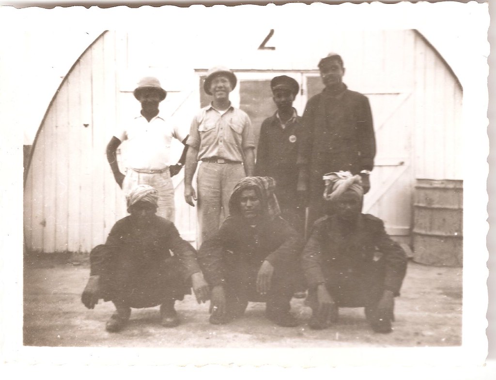 Bechtel International employee’s at a construction warehouse in Kuwait; about 1950.