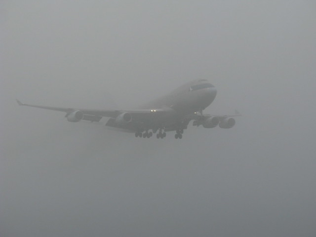 Cathay Pacific 747 emerging from thr fog at Manchester 1/11/10