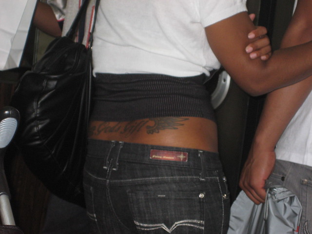 Tramp stamp that says God's Gift